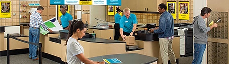 Numerous customers being helped inside The UPS Store